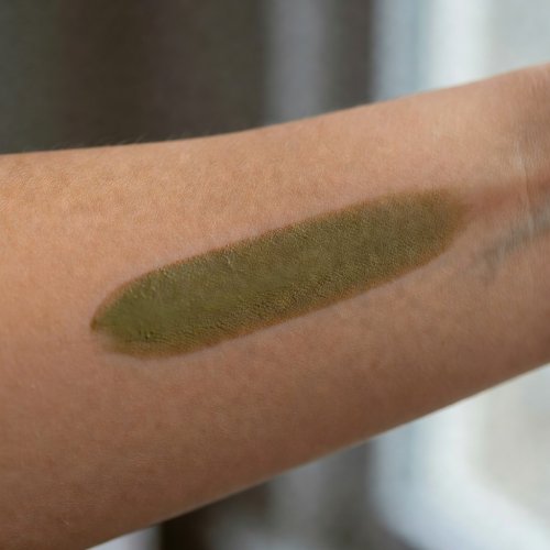 Foundation swatch on forearm, natural lighting